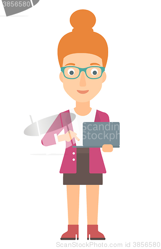 Image of Woman using laptop.