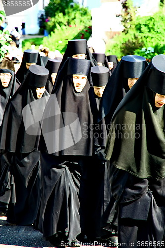 Image of Nuns take part in the religious procession