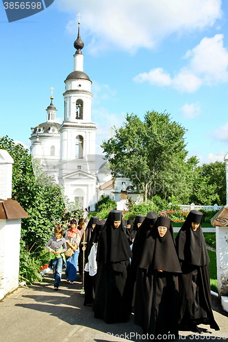 Image of Nuns take part in the religious procession