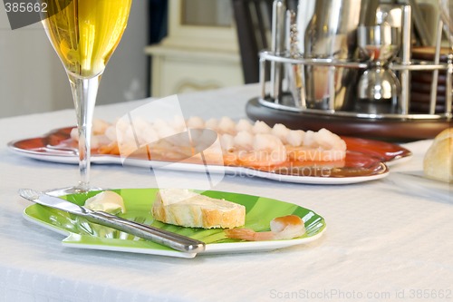 Image of Close up on sliced bread with butter on a table