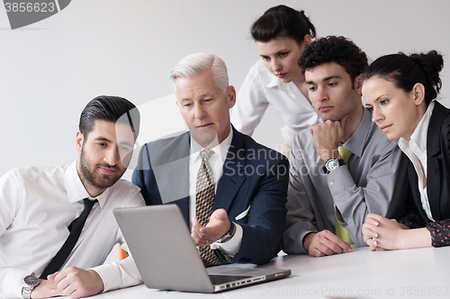 Image of business people group on meeting at modern startup office