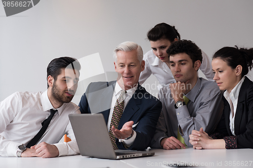 Image of business people group on meeting at modern startup office