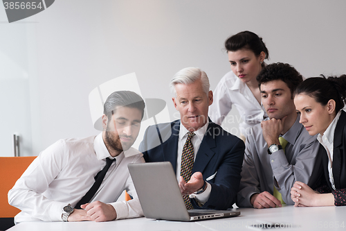 Image of business people group on meeting at modern startup office