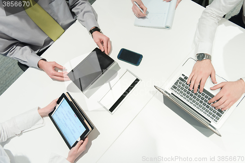 Image of aerial view of business people group brainstorming on meeting