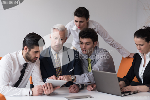 Image of business people group on meeting at modern startup office