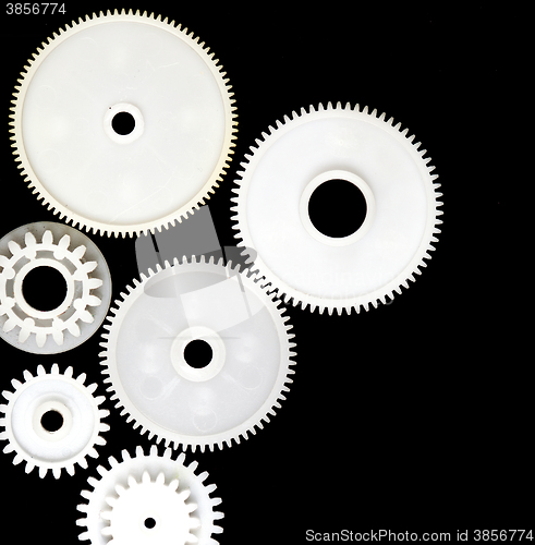 Image of gear wheels on black