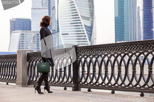 Image of woman in a dark coat