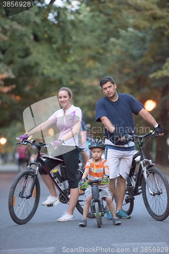 Image of young family with bicycles