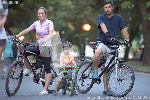 Image of young family with bicycles