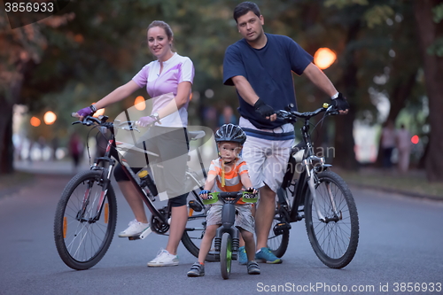 Image of young family with bicycles