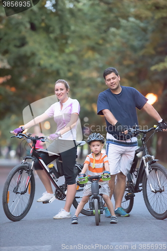 Image of young family with bicycles