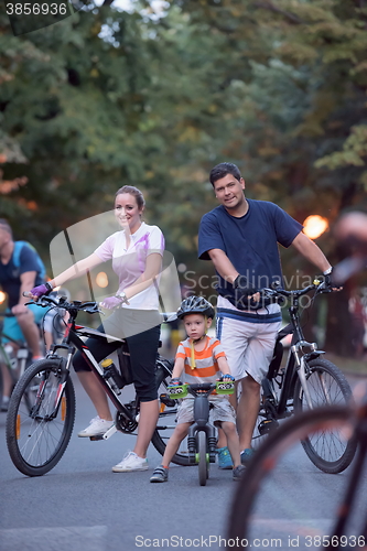 Image of young family with bicycles