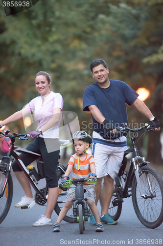 Image of young family with bicycles