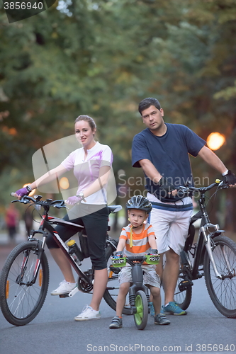 Image of young family with bicycles