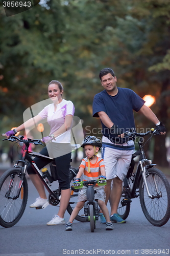 Image of young family with bicycles