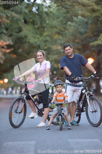 Image of young family with bicycles