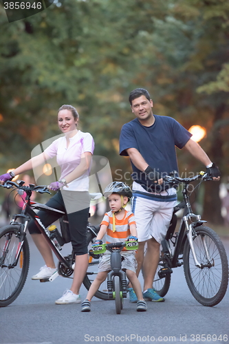 Image of young family with bicycles