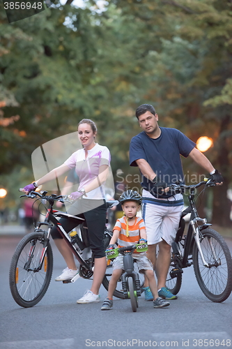 Image of young family with bicycles