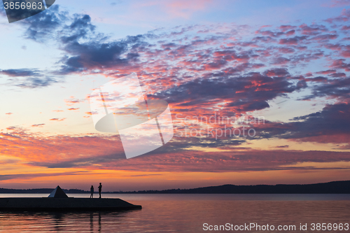 Image of Romance on lakeside at sunset