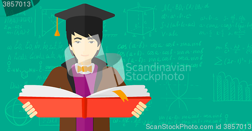 Image of Man in graduation cap holding book.