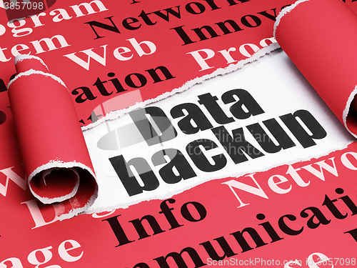 Image of Data concept: black text Data Backup under the piece of  torn paper