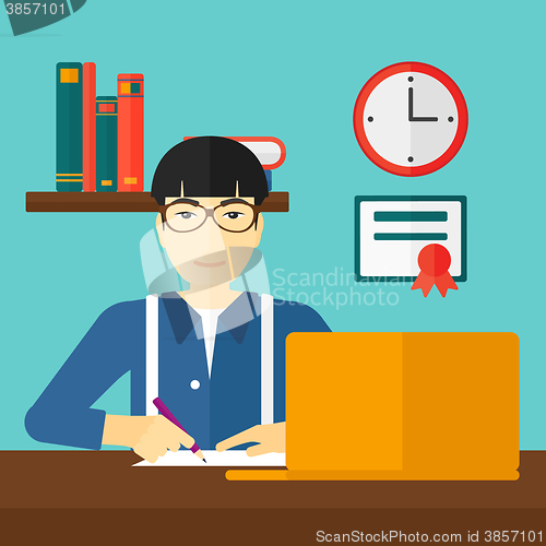 Image of Man using laptop for education.