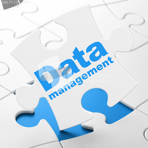 Image of Data concept: Data Management on puzzle background