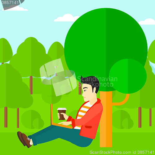Image of Man using laptop for education.