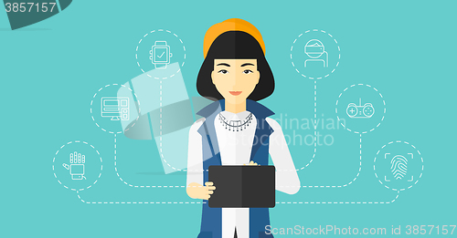 Image of Woman holding tablet computer.