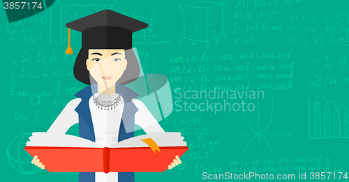 Image of Woman in graduation cap holding book.