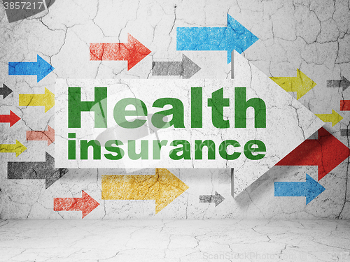 Image of Insurance concept: arrow with Health Insurance on grunge wall background
