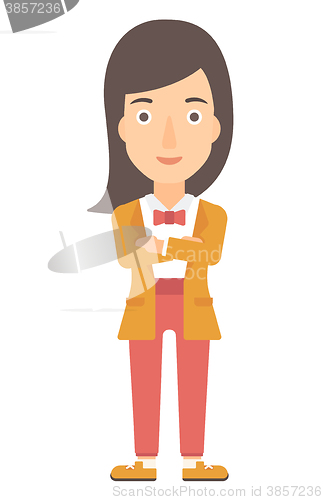 Image of Woman standing with crossed arms.
