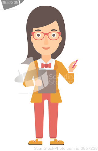Image of Woman standing with pen and file in hands.
