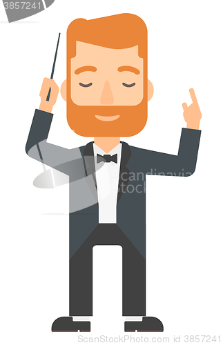 Image of Conductor directing with his baton.