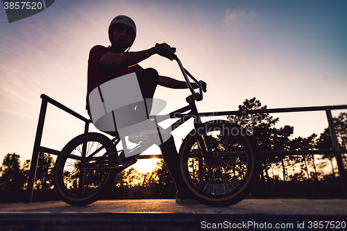 Image of Bmx rider and his bike silhouette