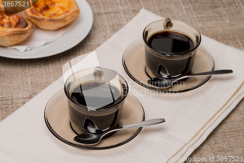 Image of Portuguese Custard Tarts with Coffee