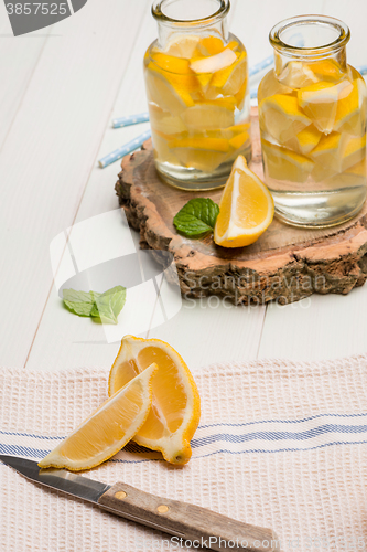 Image of Lemon and lime slices in jars