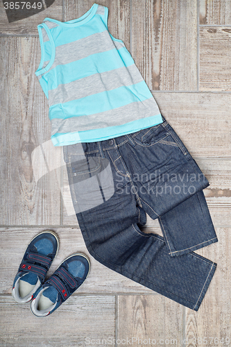 Image of Boy\'s clothing on the floor