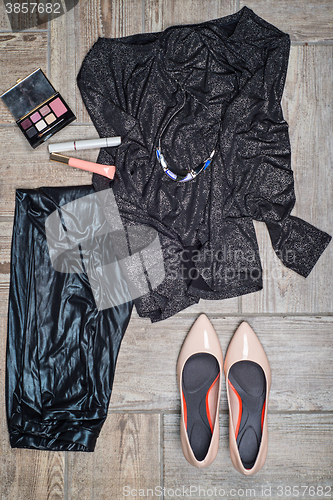 Image of Overhead view of girl\'s fashion with accessories.