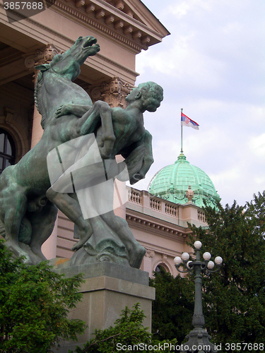 Image of Parliament building with national flag Belgrade Serbia Europe st