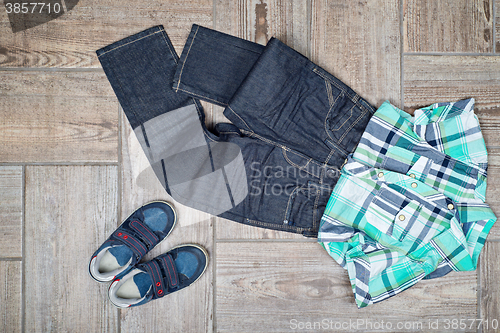 Image of Flat lay picture of boy\'s casual outfit. 