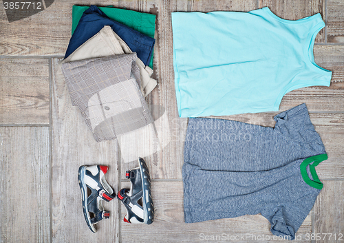 Image of Flat lay photography of some boy\'s casual outfits. 