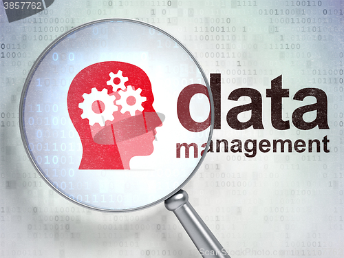 Image of Data concept: Head With Gears and Data Management with optical glass