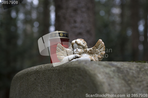 Image of Stone angel at a grave