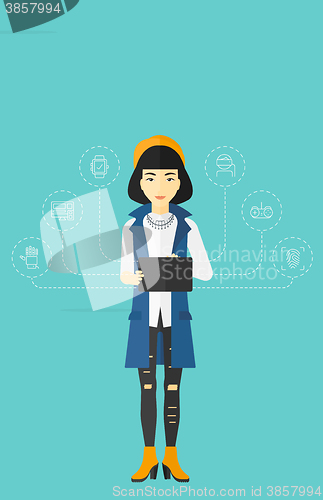 Image of Woman holding tablet computer.