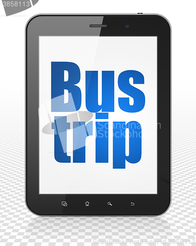 Image of Tourism concept: Tablet Pc Computer with Bus Trip on display