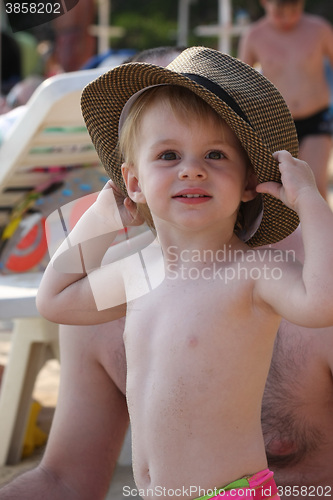 Image of Baby girl posing on the beach