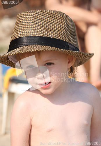 Image of Baby girl posing on the beach