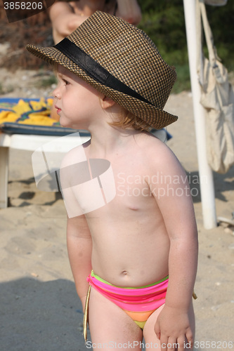 Image of Baby girl posing on the beach