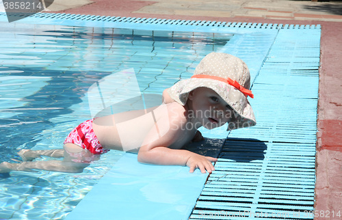 Image of Baby girl in swimming pool